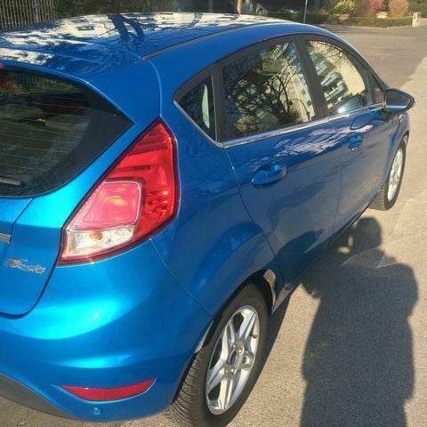 Gebraucht Ford Fiesta Titanium 125 PS (91 kW) 2014 Blau metallic Kleinwagen