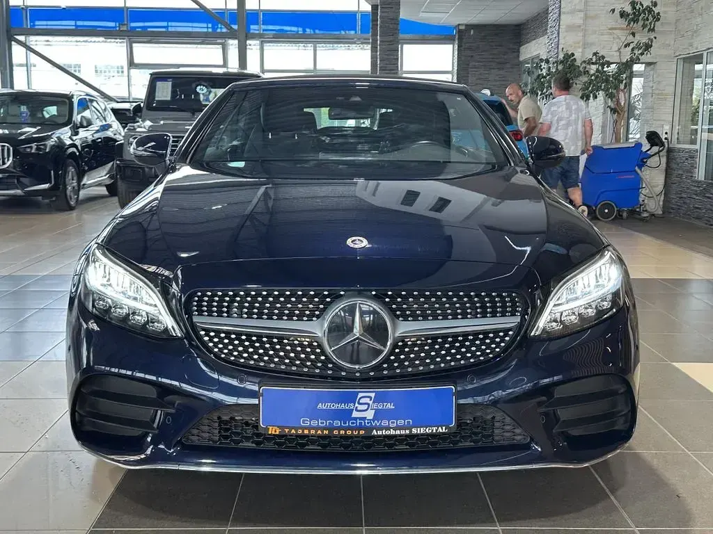 Gebraucht Mercedes C300 AMG line 258 PS (189 kW) 2022 Blau cavansitblau  metalliclack (metallic) Cabrio