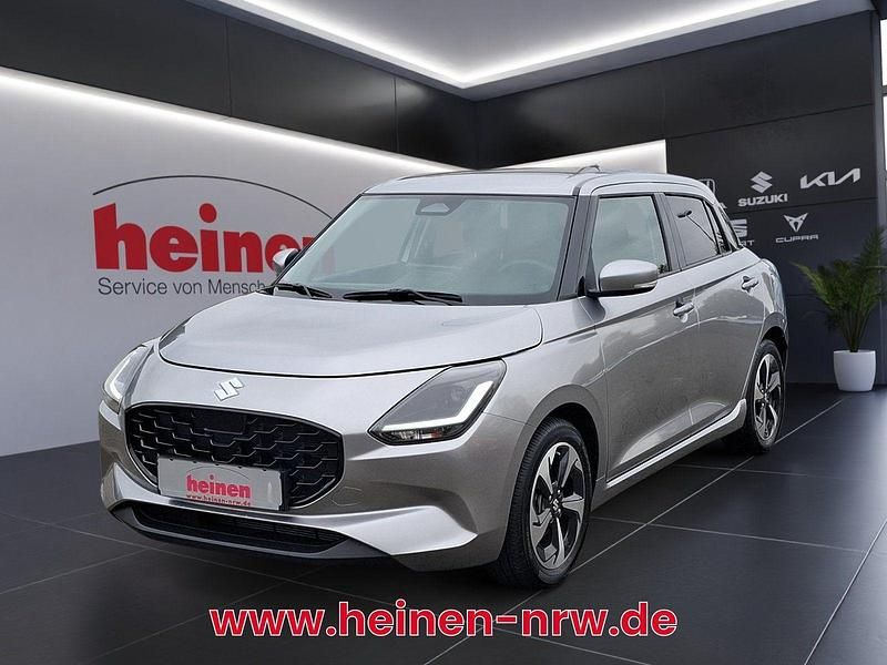 Silber Gebraucht 2024 Suzuki Swift Comfort+ Kleinwagen | 17.298 € (Fairer Preis) - Bild 1/4