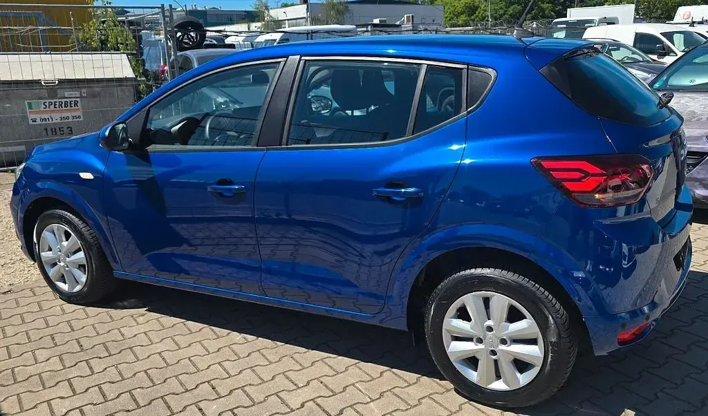 Gebraucht Dacia Sandero Expression 91 PS (66 kW) 2024 Blau Limousine