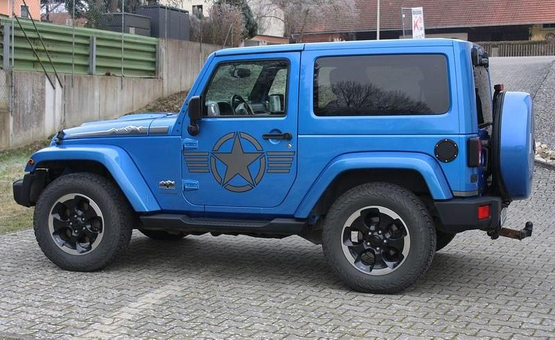 Blau Gebraucht 2014 Jeep Wrangler SUV | 31.450 € (Fairer Preis) - Bild 1/4