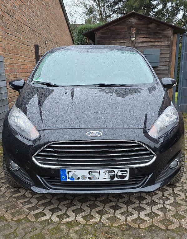 Gebraucht Ford Fiesta Trend 101 PS (74 kW) 2014 Schwarz Kleinwagen
