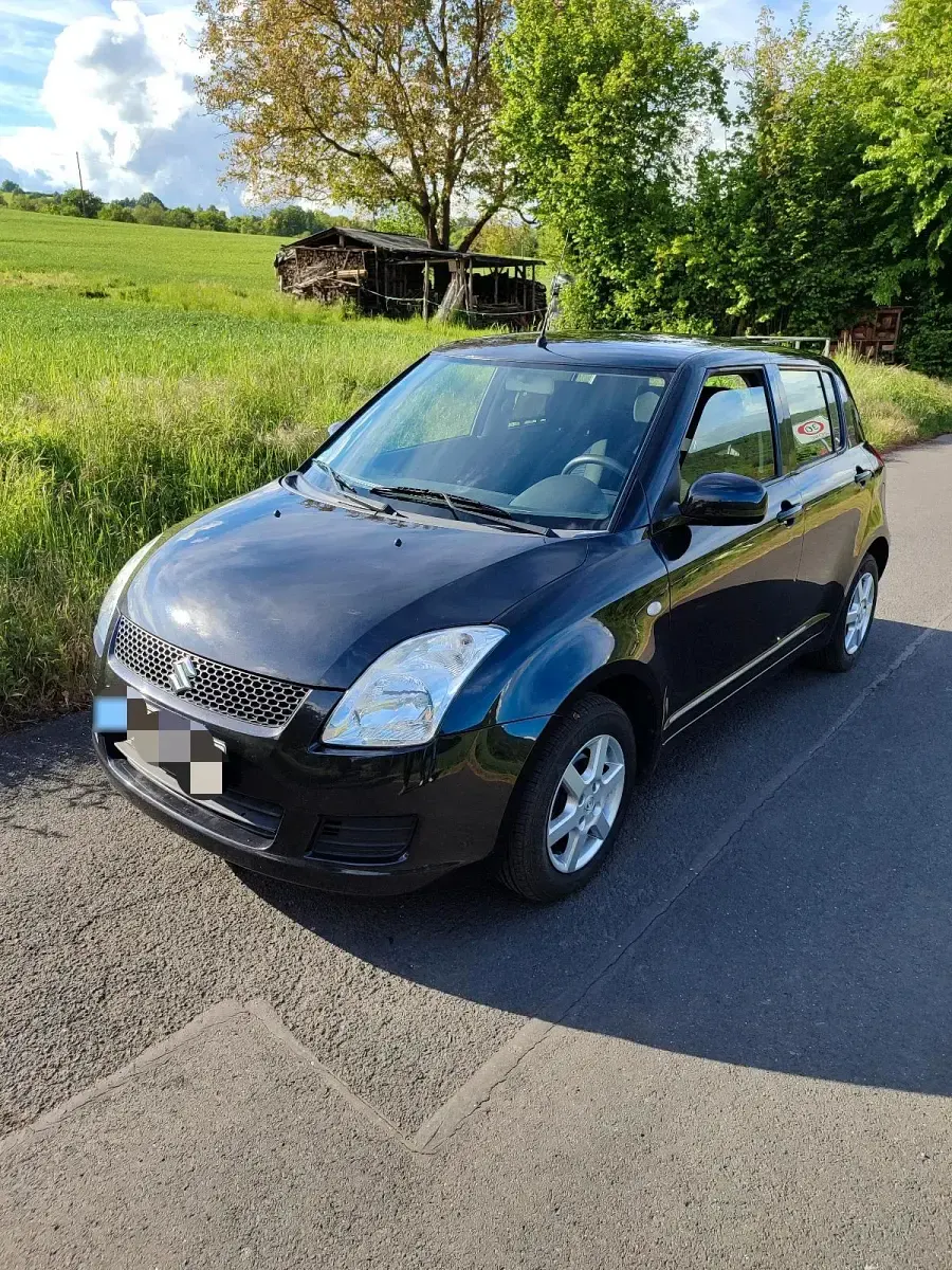 Gebraucht Suzuki Swift 92 PS (67 kW) 2010 Schwarz Kleinwagen