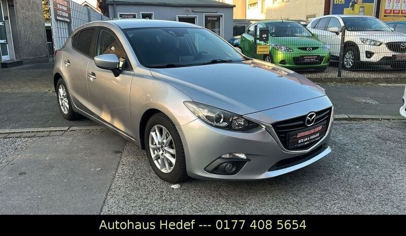 Grau Gebraucht 2014 Mazda 3 Center-Line Limousine | 10.890 € (Fairer Preis) - Bild 1/4