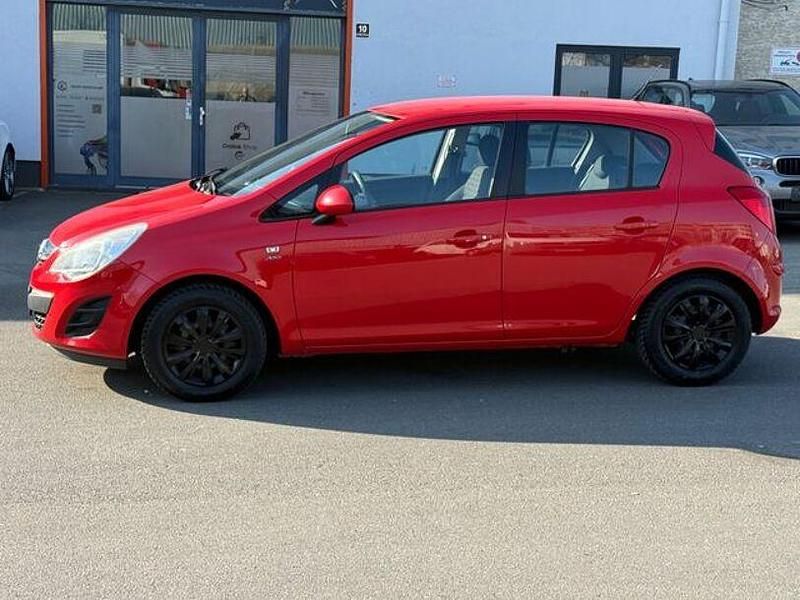 Gebraucht Opel Corsa Active 87 PS (63 kW) 2013 Rot Kleinwagen