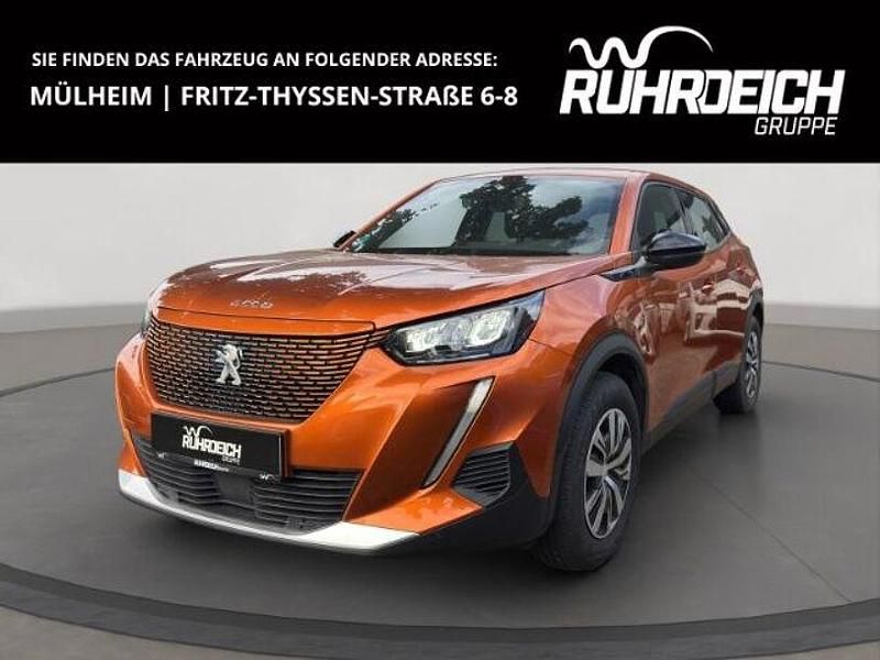 Orange Gebraucht 2023 Peugeot e-2008 Active SUV | 21.490 € (Fairer Preis) - Bild 1/4
