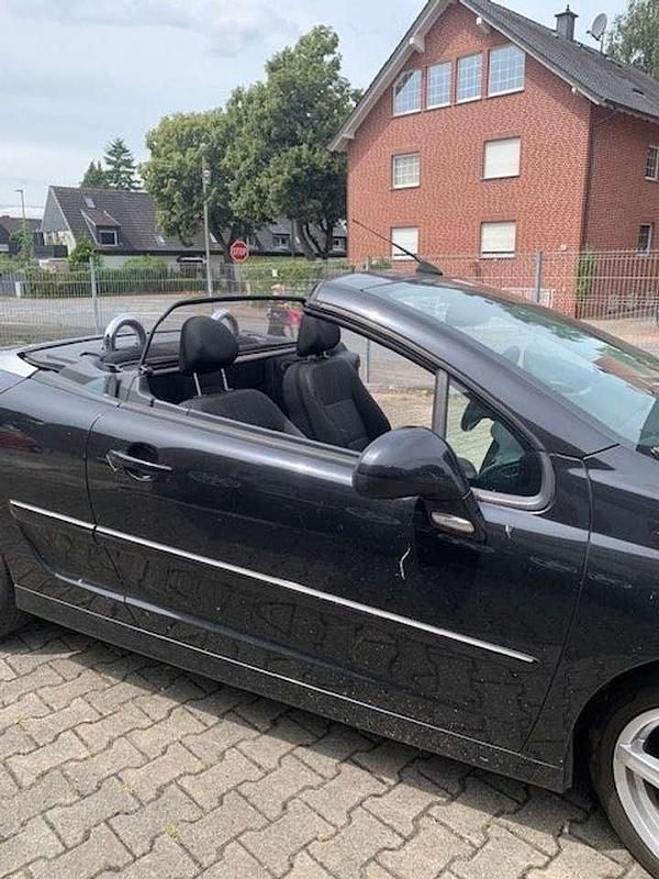 Schwarz Gebraucht 2012 Peugeot 207 CC Roland Garros Cabrio | 4.970 € (Fairer Preis) - Bild 1/4