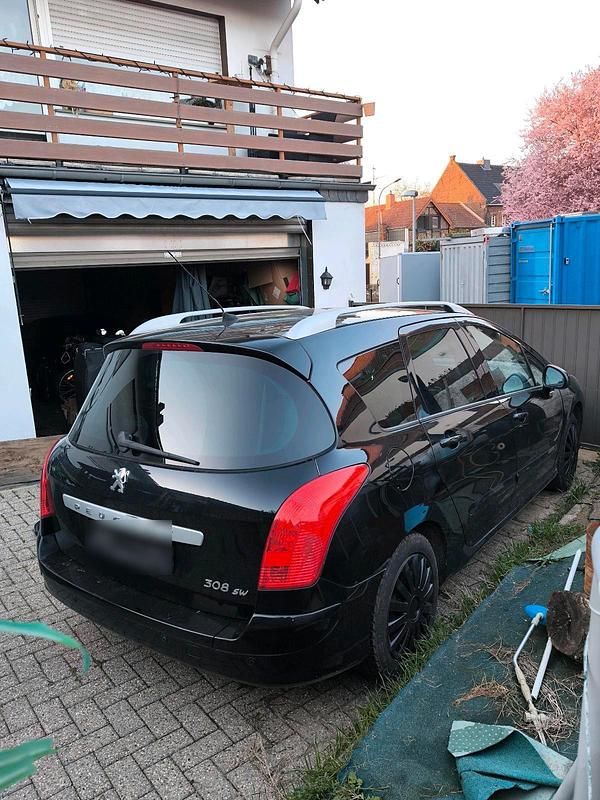 Gebraucht Peugeot 308 SW 109 PS (80 kW) 2010 Schwarz Kombi