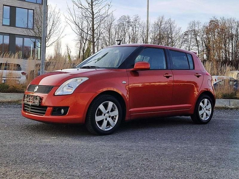 Gebraucht Suzuki Swift Snow 92 PS (67 kW) 2009 Orange Kleinwagen