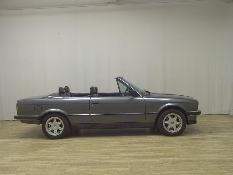 Delphin metallic Gebraucht 1986 BMW 325 Cabrio | 19.890 € - Bild 1/4