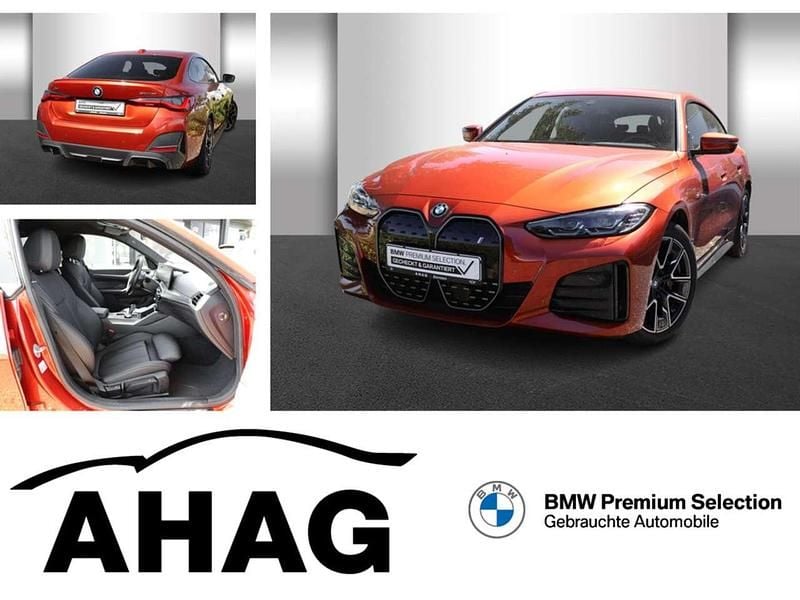 Sunset orange metallic Gebraucht 2022 BMW i4 M Sport Limousine | 39.740 € (Guter Preis) - Bild 1/4