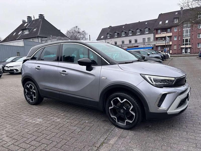 Gebraucht Opel Crossland X Elegance 110 PS (80 kW) 2021 Kontrast grau/quarz silber SUV
