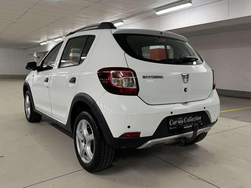 Gebraucht Dacia Sandero Prestige 90 PS (66 kW) 2014 Gletscherweiss Kleinwagen
