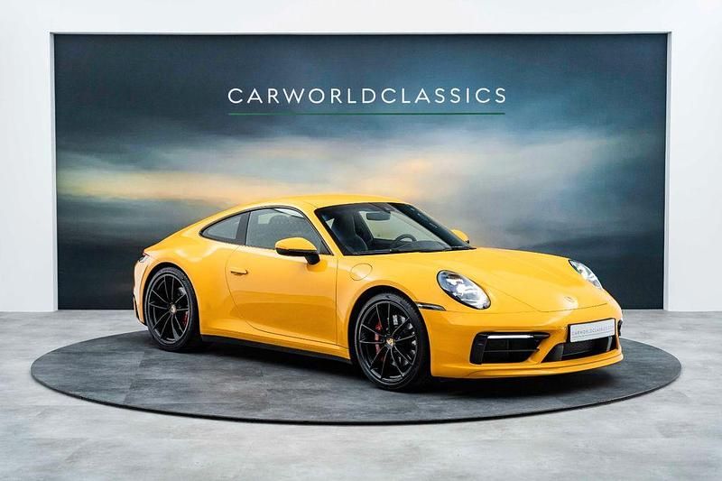 Gelb Gebraucht 2021 Porsche 992 Coupé | 129.992 € (Superpreis) - Bild 1/4