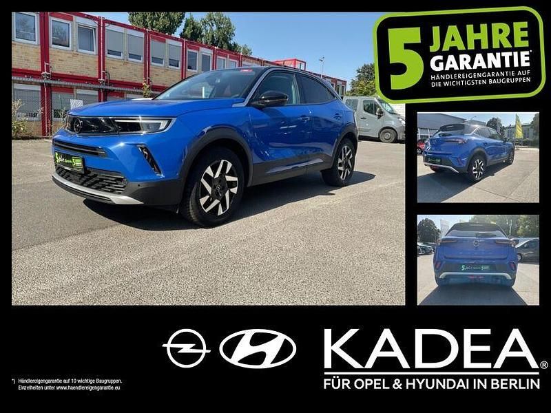 Perl blau/voltaik blau (metallic) Gebraucht 2021 Opel Mokka Elegance SUV | 14.890 € (Fairer Preis) - Bild 1/4