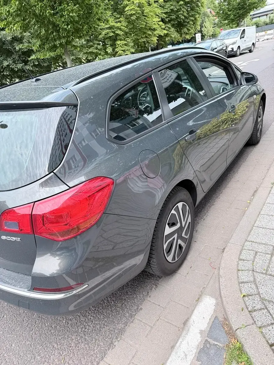Gebraucht Opel Astra 110 PS (80 kW) 2015 Grau Kombi