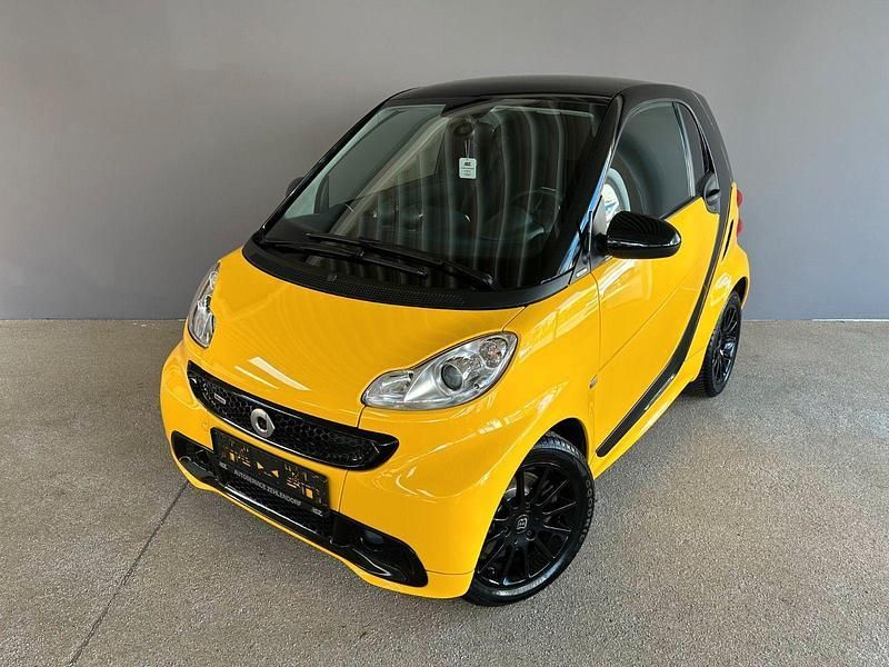 Gelb Gebraucht 2013 Smart ForTwo Coupé Kleinwagen | 8.799 € (Teuer) - Bild 1/3