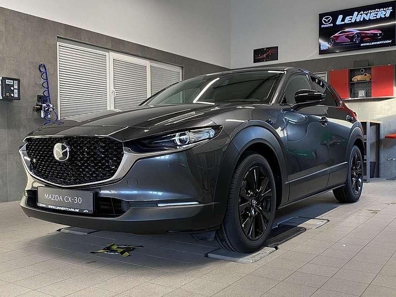 Machine gray Neu 2024 Mazda CX-30 Homura-Line SUV | 34.590 € - Bild 1/4