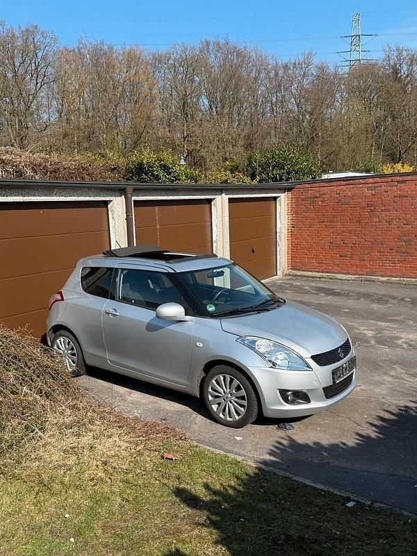 Gebraucht Suzuki Swift 75 PS (55 kW) 2013 Silber Kleinwagen