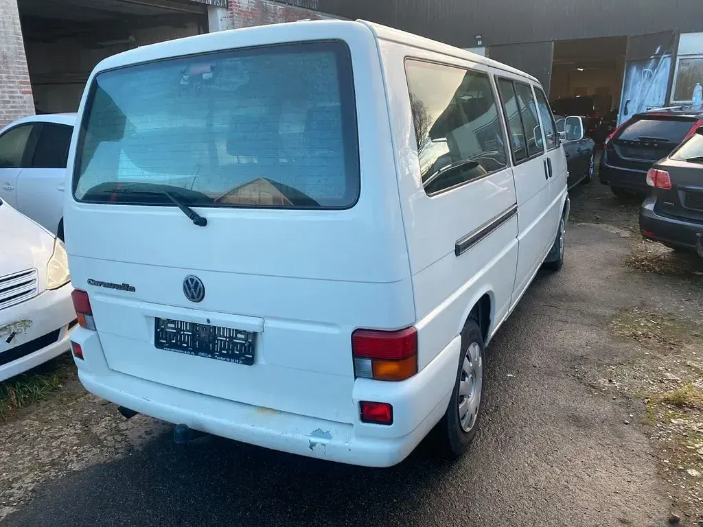 Second-hand VW Caravelle 116 CP (85 kW) 2003 Alb Van