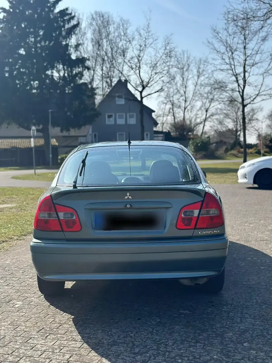 Gebraucht Mitsubishi Carisma 103 PS (75 kW) 2003 Grün Limousine