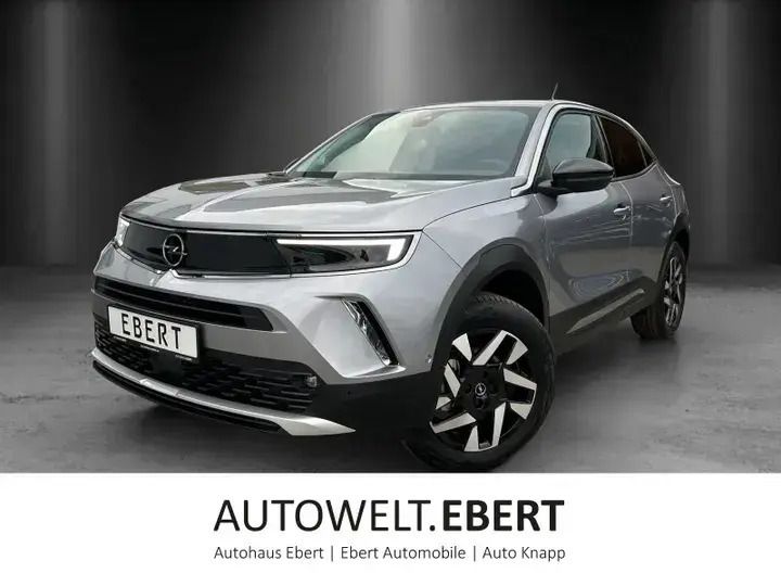 Kontrast grau/quarz silber Gebraucht 2023 Opel Mokka Elegance SUV | 21.890 € (Fairer Preis) - Bild 1/4