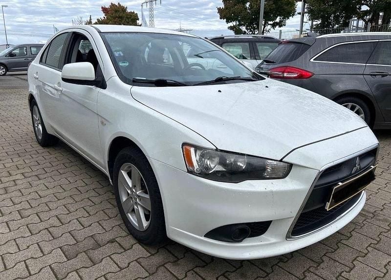 Weiß Gebraucht 2009 Mitsubishi Lancer Limousine | 4.890 € (Fairer Preis) - Bild 1/4