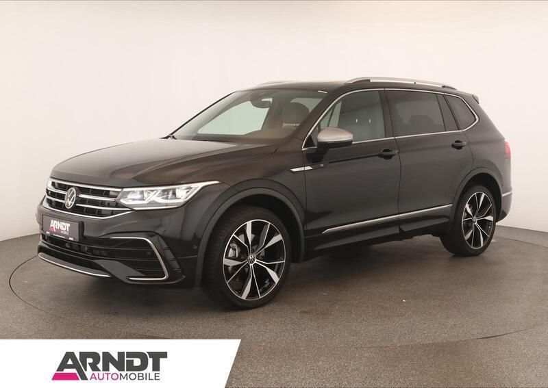 Deep black perleffekt Gebraucht 2024 VW Tiguan Allspace R-line SUV | 46.384 € (Fairer Preis) - Bild 1/4