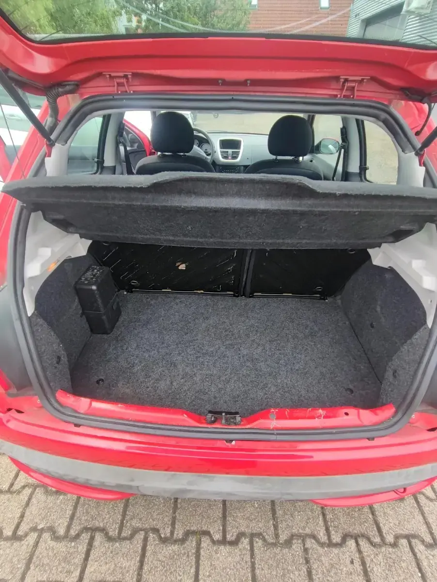 Gebraucht Peugeot 206+ 85 PS (62 kW) 2009 Rot Kleinwagen