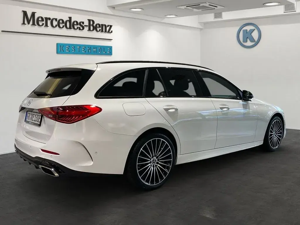 Gebraucht Mercedes C300e AMG line 313 PS (230 kW) 2025 Polarweiß Kombi