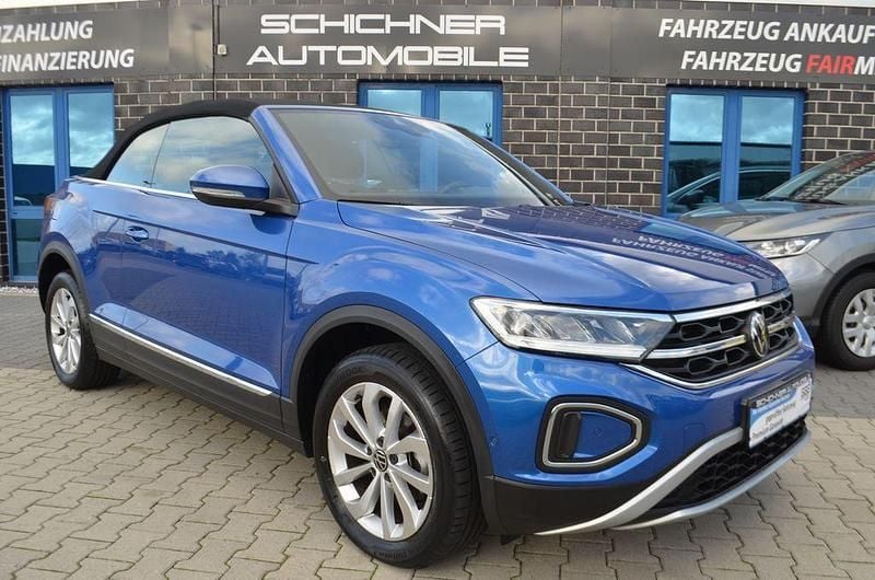 Blau Gebraucht 2024 VW T-Roc Cabriolet Style Cabrio | 28.390 € (Superpreis) - Bild 1/4