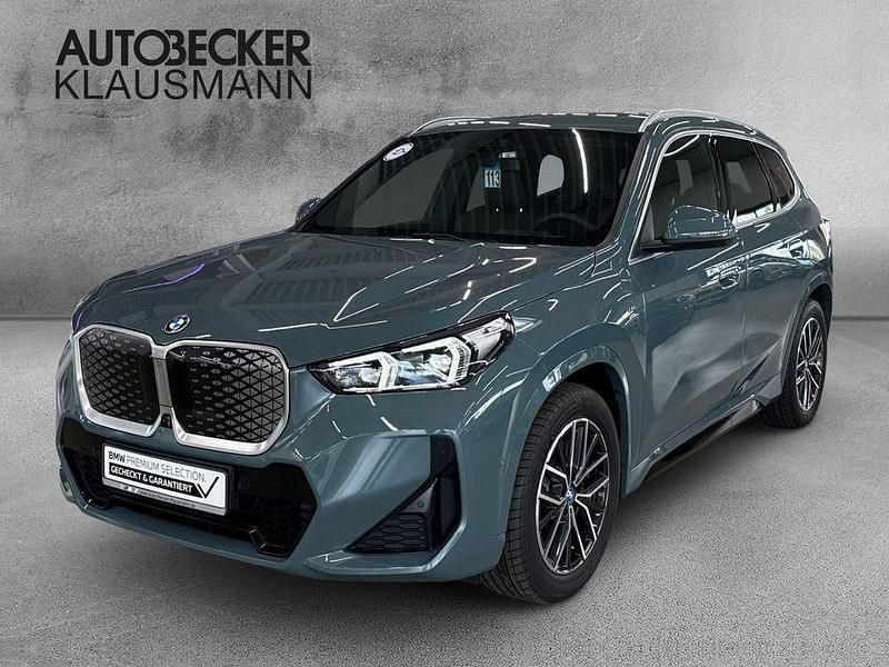 Gruen Gebraucht 2024 BMW iX1 M Sport SUV | 48.589 € (Fairer Preis) - Bild 1/4