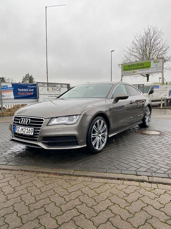 Grau Gebraucht 2013 Audi A7 Sportback Ambiente Kleinwagen | 17.990 € (Fairer Preis) - Bild 1/4