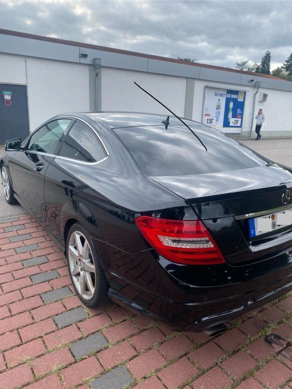 Schwarz Gebraucht 2012 Mercedes C250 AMG Coupé | 10.599 € (Superpreis) - Bild 1/4