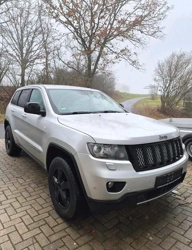 Silber Gebraucht 2012 Jeep Grand Cherokee Overland SUV | 8.500 € (Fairer Preis) - Bild 1/4