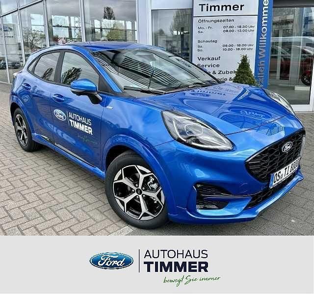 Desert island blue metallic Gebraucht 2025 Ford Puma Gen-E ST-Line SUV | 26.940 € - Bild 1/4