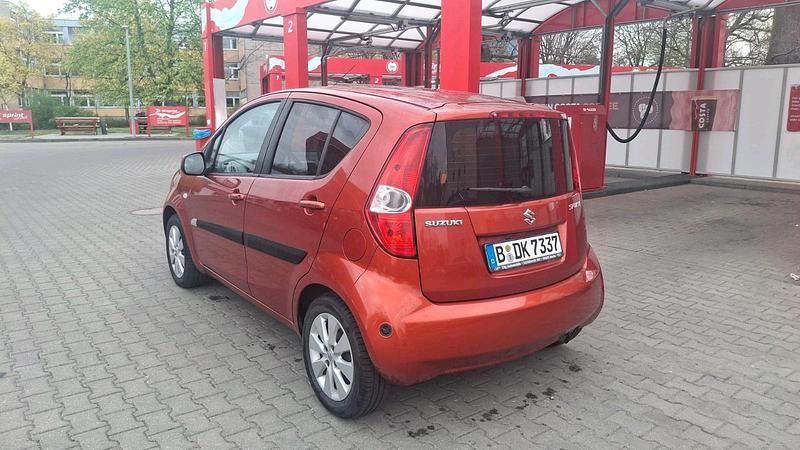 Second-hand Suzuki Splash 86 CP (63 kW) 2009 Portocaliu Hatchback