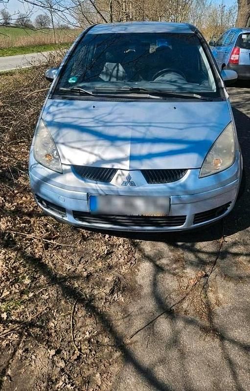 Second-hand Mitsubishi Colt 109 CP (80 kW) 2004 Argintiu Hatchback