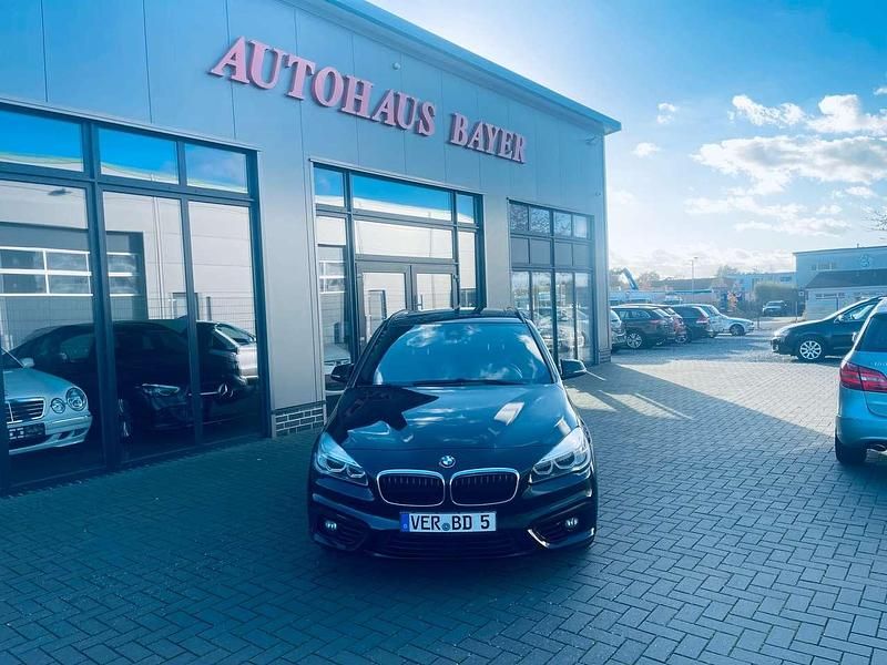 Black sapphire metallic Gebraucht 2014 BMW 218 Van / Kleinbus | 8.999 € (Fairer Preis) - Bild 1/4