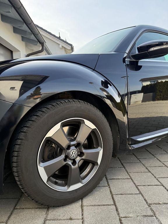 Gebraucht VW Beetle 105 PS (77 kW) 2011 Schwarz Kleinwagen