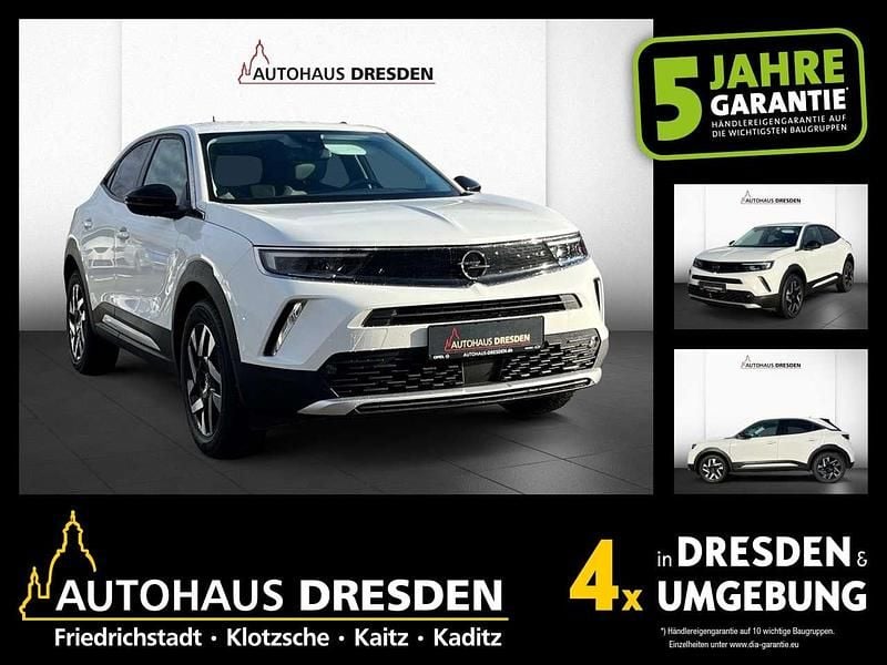 Jade weiss (metallic) Gebraucht 2022 Opel Mokka-e Elegance SUV | 16.990 € (Guter Preis) - Bild 1/4