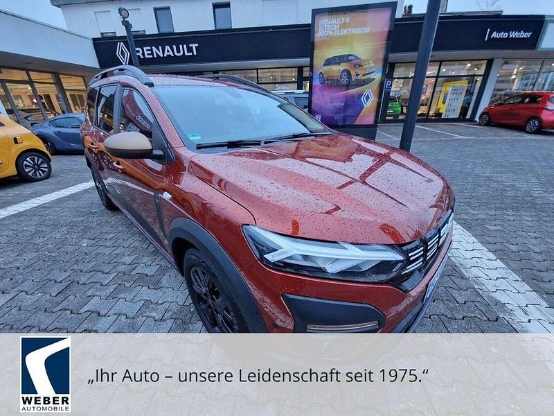 Braun Gebraucht 2024 Dacia Jogger Extreme Limousine | 22.470 € (Fairer Preis) - Bild 1/4