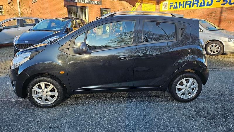 Gebraucht Chevrolet Spark 82 PS (60 kW) 2012 Schwarz Kleinwagen