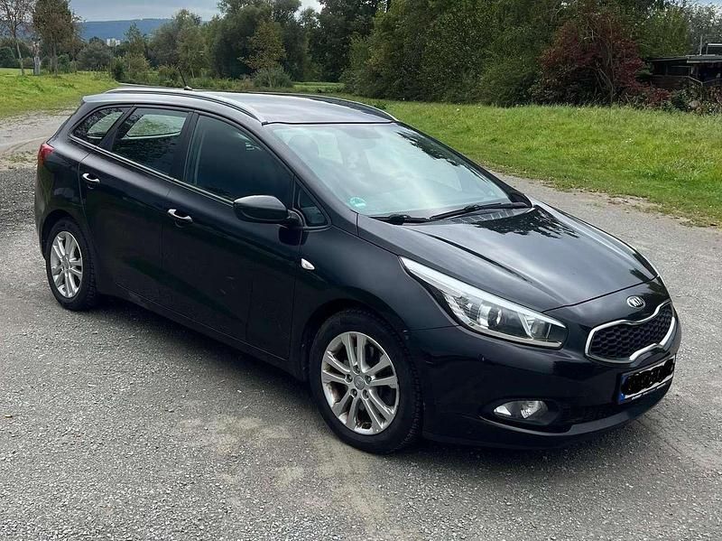 Schwarz Gebraucht 2015 Kia Ceed Sportswagon Spirit Kombi | 8.799 € (Fairer Preis) - Bild 1/4