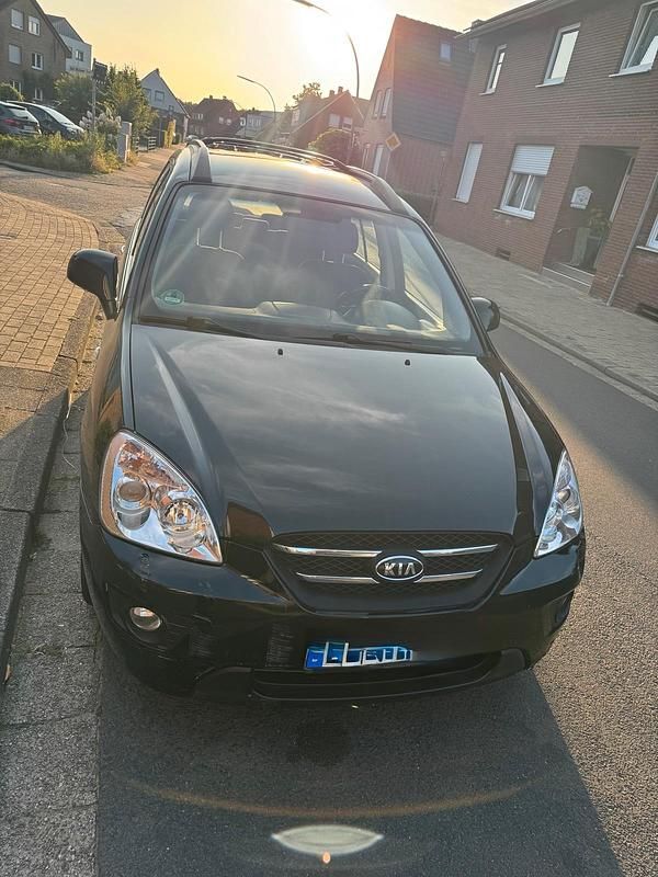 Schwarz Gebraucht 2008 Kia Carens Van / Kleinbus | 2.295 € (Fairer Preis) - Bild 1/4