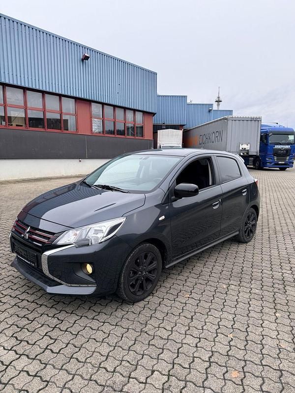 Grau Gebraucht 2024 Mitsubishi Space Star Select+ Kleinwagen | 13.499 € (Fairer Preis) - Bild 1/4