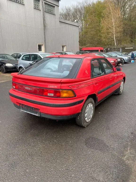 Gebraucht Mazda 323F 88 PS (64 kW) 1991 Rot Kleinwagen