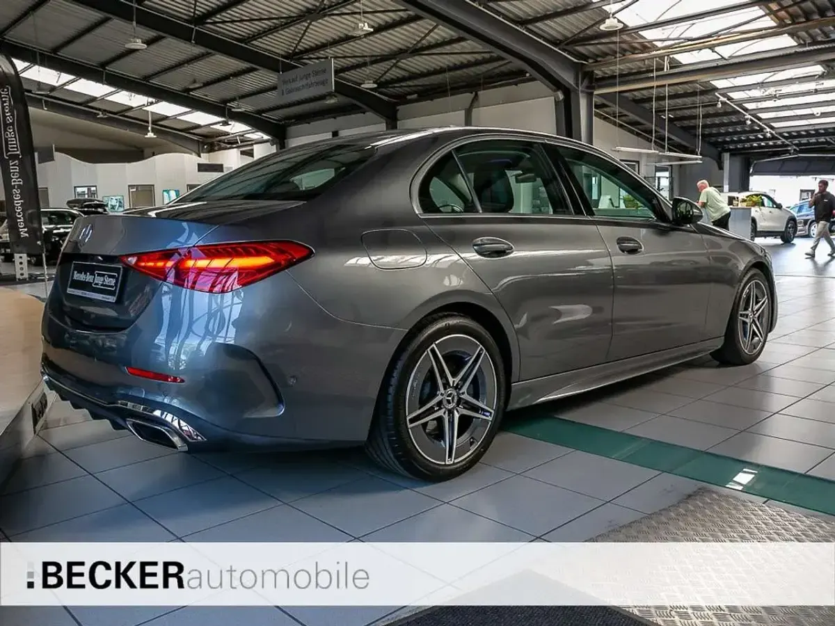Gebraucht Mercedes C180 AMG 193 PS (141 kW) 2025 Selenitgrau Limousine