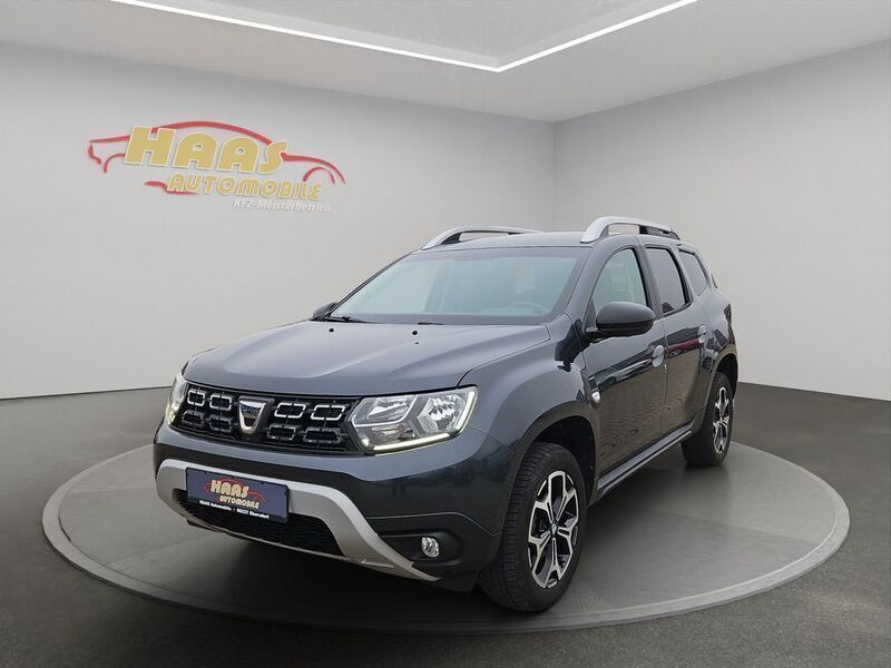 Grau Gebraucht 2020 Dacia Duster Celebration SUV | 16.390 € (Fairer Preis) - Bild 1/2