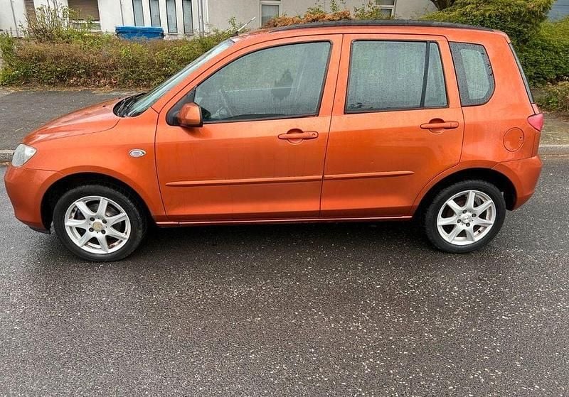 Second-hand Mazda 2 80 CP (58 kW) 2003 Portocaliu Hatchback